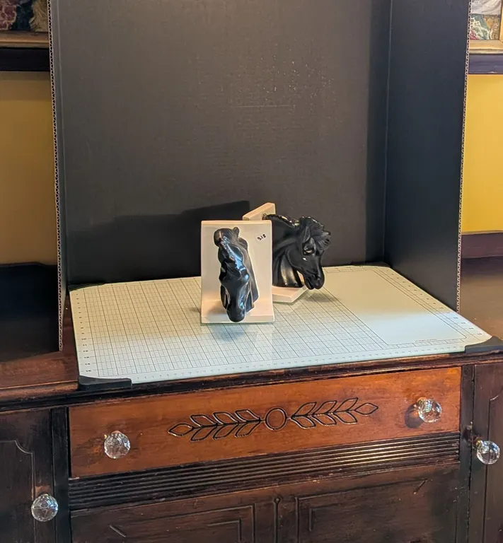 Pair of horse-head, stallion-bust bookends on L-shaped bases.