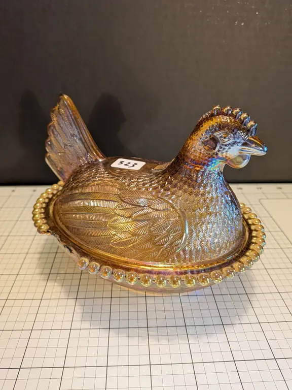 Damaged carnival glass Hen on Nest lidded dish, measuring about 7 inches. Top is mint condition, bot