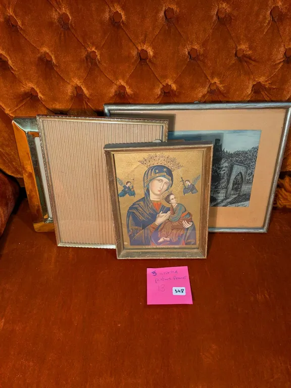 Five assorted picture frames (and some art).