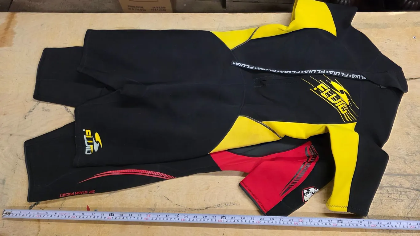 (2) “Fluid” Wetsuits