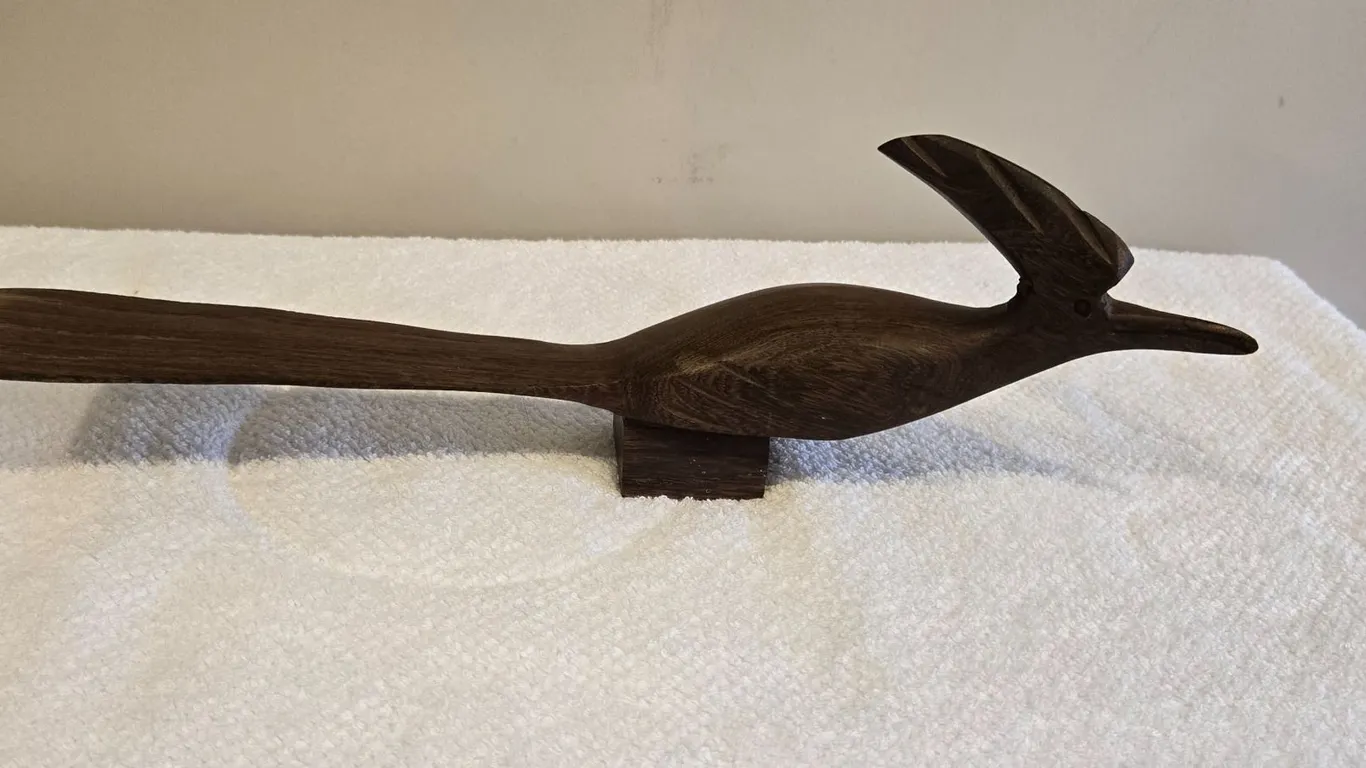 Vintage hand-carved ironwood roadrunner sculpture. Approx 15" long, 5" high