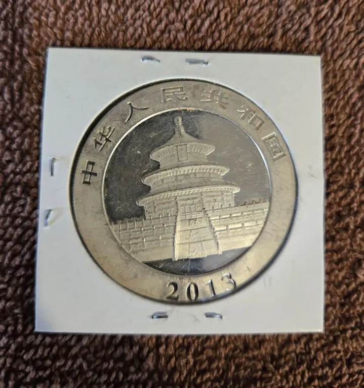 2013 1 oz. .999 fine silver Chinese Panda coin.