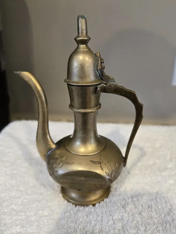 Vintage solid brass teapot Genie lamp pitcher. 6" tall. Marked India 127, but hard to see.
