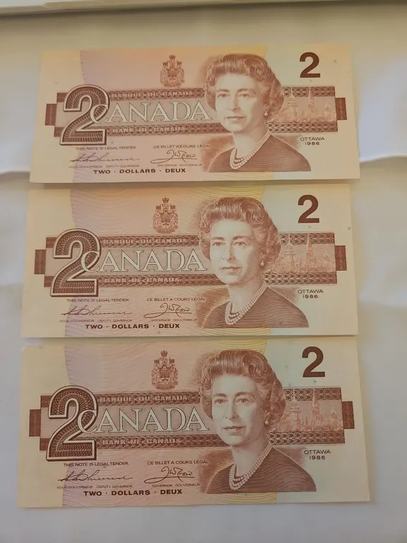 3 - 1986 Cdn $2 bills, light-circulation