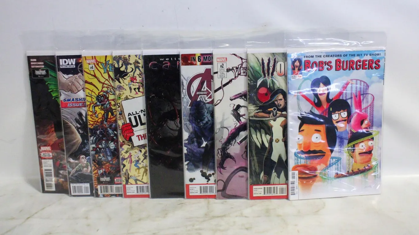 9 ASSORTED COMIC BOOKS BAGGED &