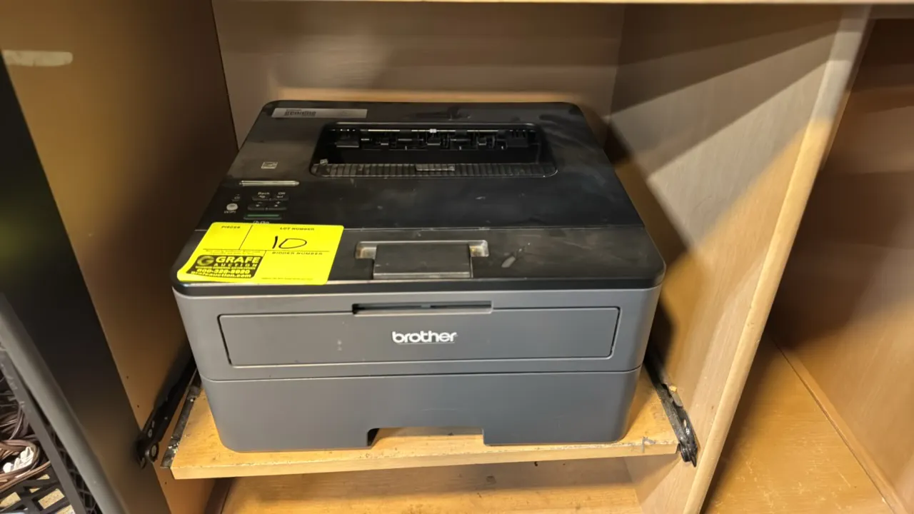 Brother HL-L2370DW monochrome laser printer. Features wireless connectivity, top control panel with LCD screen, and front-loading paper cassette tray.