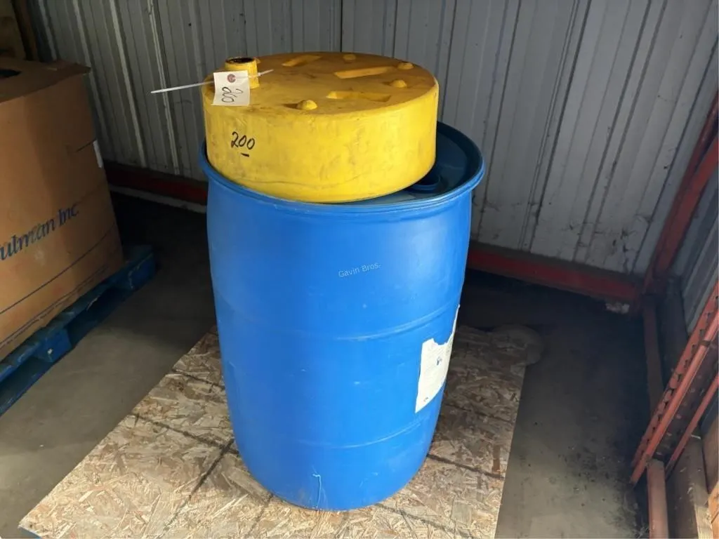 Plastic Barrel - approx 1/3 full of waste oil