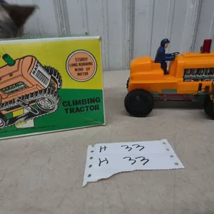 Marx Sparkling Climbing Tractor Wind-Up Toy with Driver and Original Box, Made in Japan, 7.6”