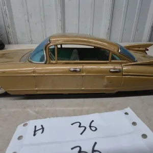 Vintage Japanese Tinplate 1959 Cadillac Sedan Toy Car in Gold With Tail Fins, 11”