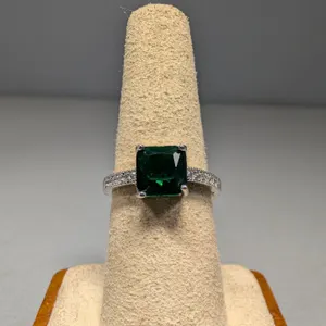 Silver Tone Ring with Cut Green Stone and Clear Accents