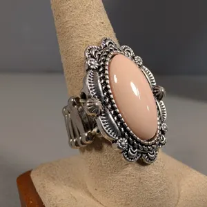 Expandable Ring with Pink Cabochon and Ornate Setting