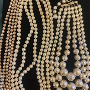 Three multi strand pearl like necklaces