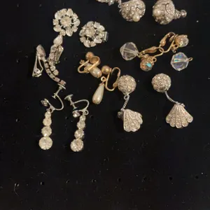 Nine rhinestone earrings pairs