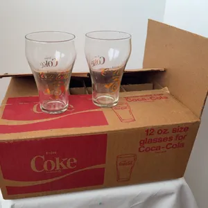 Vintage case of 12 oz. Coca-Cola glasses in a red and white branded cardboard box