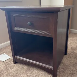 Dark brown wooden nightstand with one drawer and an open lower shelf Approximately 23 in. W x 28 in.