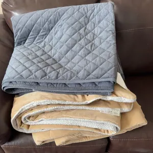 Pair of full/queen size quilted blankets.