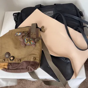 A lot of three bags, including a olive canvas crossbody bag by Chala
