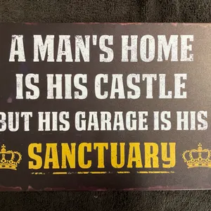 Vintage-Style Sign "A Man's Home Is His Castle, But His Garage Is His Sanctuary"
