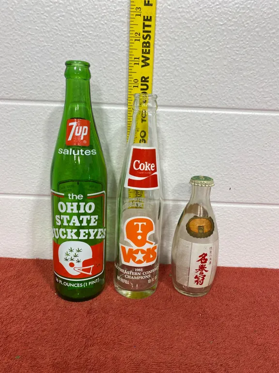 Three Commemorative Glass Soda Bottles