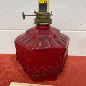 Red Glass Oil Lamp with Decorative Design and Metal Burner