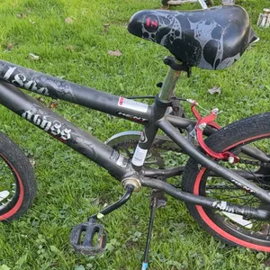 Charcoal gray Kent Abyss 18" Freestyle BMX Bicycle.