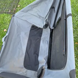 Collapsible, soft-sided portable pet crate or travel kennel