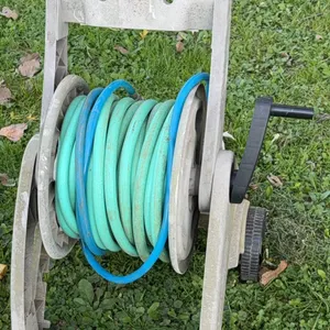 Plastic garden hose reel cart