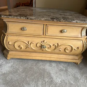American Signature Bombe-Style Coffee Table with Stone-Look Top and Drawers