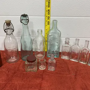 Vintage Glass Apothecary, Medicine, and Swing-Top Storage Bottles.