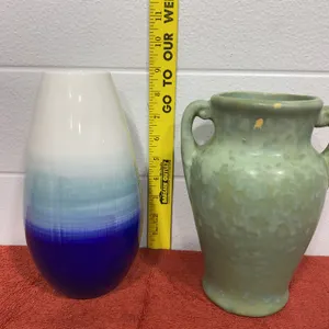 Pottery Set Featuring a Green Mottled Two-Handled Vase and Blue Gradient Vase.