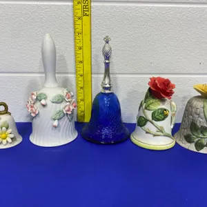 Five Decorative Bells with Floral Motifs, Various Materials