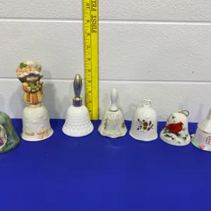 Seven Decorative Ceramic and Porcelain Bells