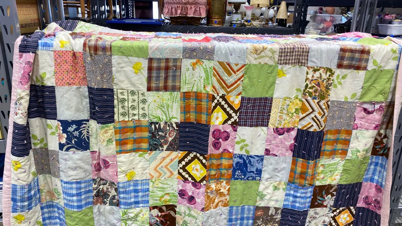 Handmade Patchwork Quilt Featuring Multicolor Patterns and Prints