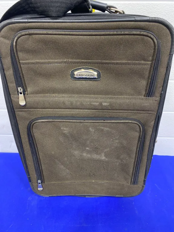 Briggs & Riley Expandable Wheeled Luggage with Telescoping Handle
