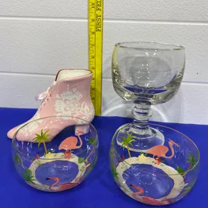 Decorative Lot With Flamingo Bowls, Glass Goblet, and Ceramic Pink Boot