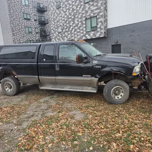 2003 Ford F350 4x4 ext cab w/ Boss Poly-V XT 8'2" v-plow
