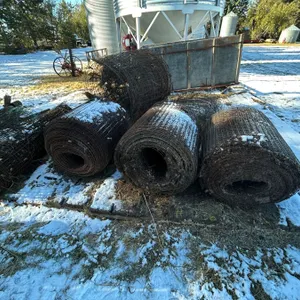 Various rolls of mesh fencing