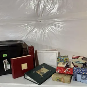 Tote of brag books, photo albums