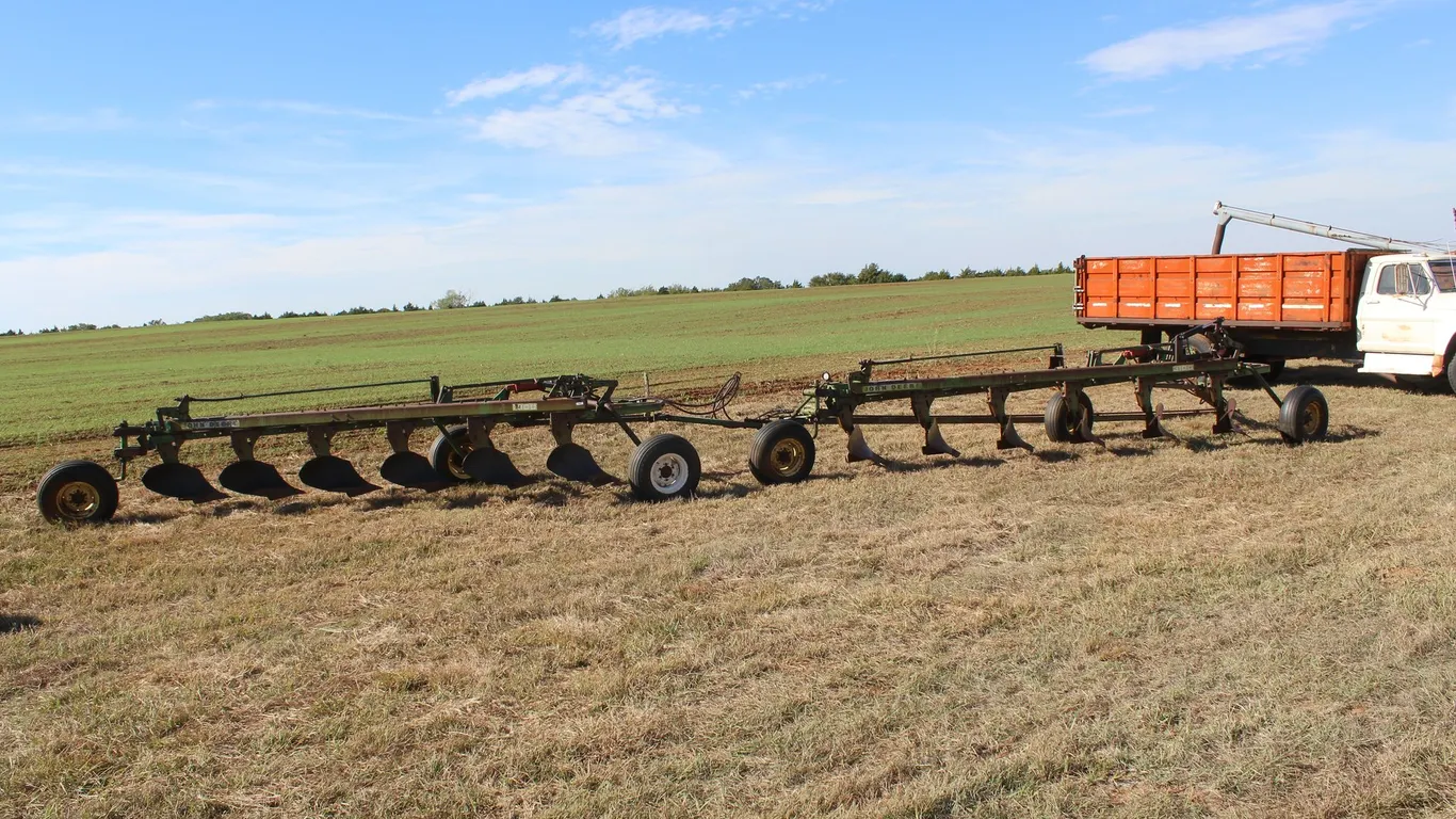 2 John Deere 6 Bottom Plow Hooked Together