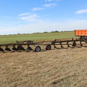 2 John Deere 6 Bottom Plow Hooked Together