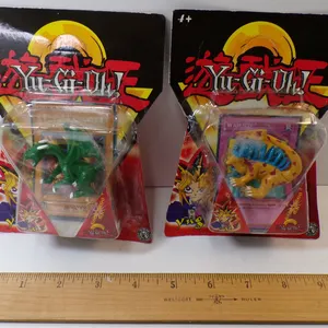 Lot of (2) New Yu-Gi_Oh! Action Figures. Includes: Waboku & Milus Radiant Magic Card.