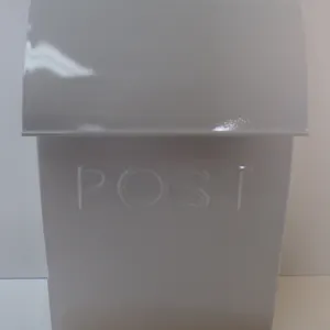 New White hanging metal mailbox. Comes with instructions and screws.