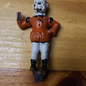 Painted Cast Iron Jointed Clown Figurine with Damage