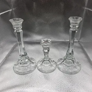 Set of three vintage clear glass candlestick holders