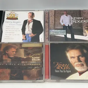 4 Kenny Rogers CDs-Love Songs, Water & Bridges, She Rides Wild Horses, & There You Go Again