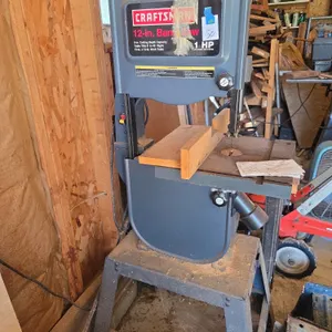 Craftsman brand 12-in band Saw on metal stand