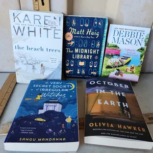 5 Like New Paperback Novels/Books See Photos