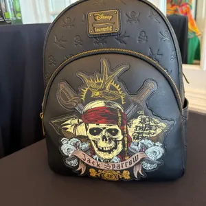 DISNEY PIRATES OF THE CARIBBEAN LOUNGEFLY BACKPACK SET SAIL FOR