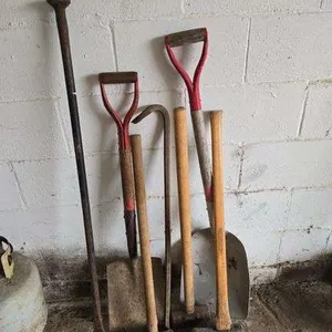Sledge hammers, axe, spud bar, shovels