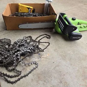Portland electric chainsaw & lots of chains